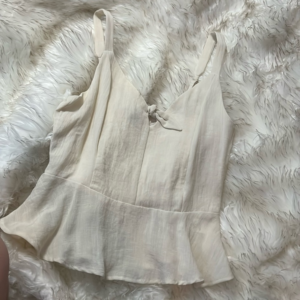 Skies are blue top with side zipper.
